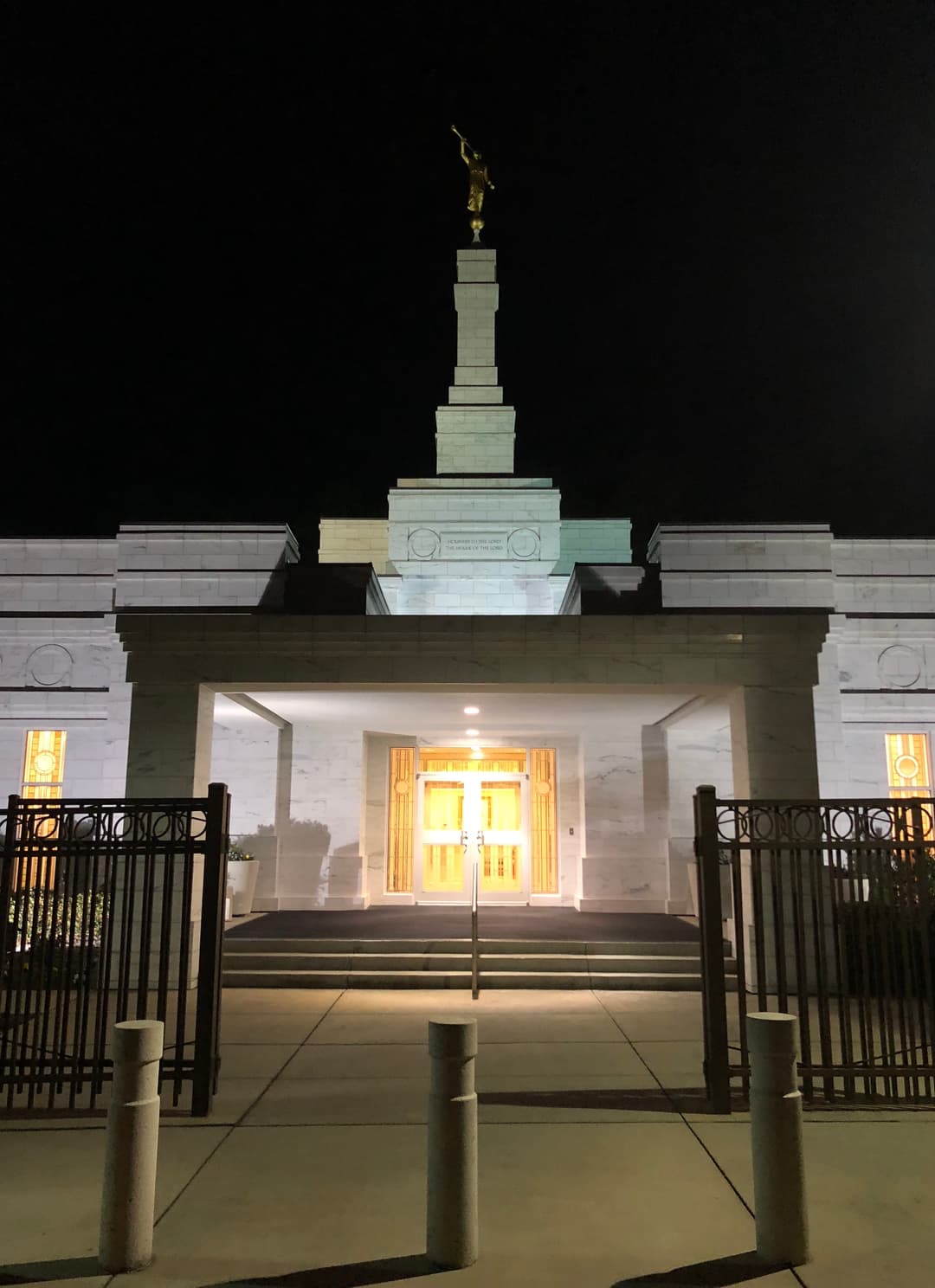 A view of the temple's single spire capped with the gold-leafed statue of the angel Moroni.