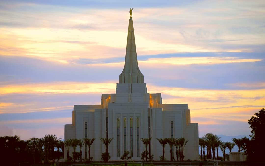 Gilbert Arizona Temple at sunset, frontal view, with Angel Moroni.