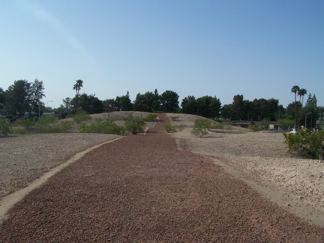 Wide-angle view of the gravel path leading up the Hohokam platform mound.