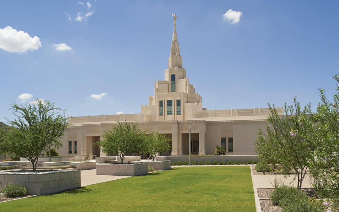 Daytime exterior view of the Phoenix Arizona Temple and landscaped grounds.