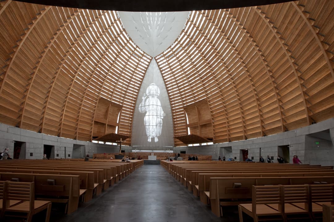 Interior view of the sanctuary looking down the aisle toward the altar.