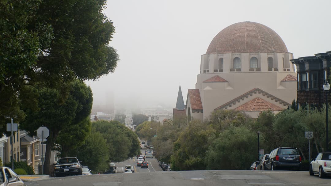 Street view of Congregation Emanu-El's dome on a foggy day