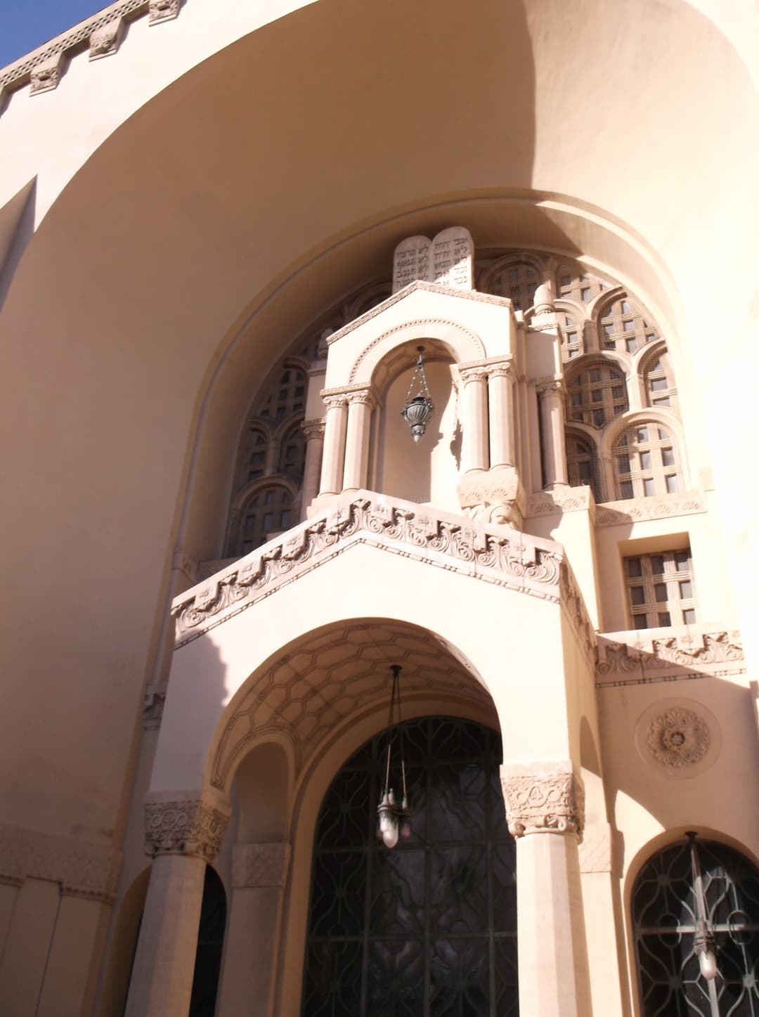 Arched courtyard entrance portico with Tablets of the Law