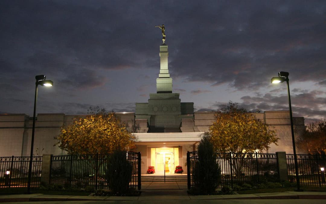 Fresno California Temple at twilight, front entrance, spire, and Angel Moroni.