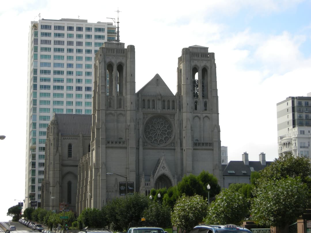 Exterior view of Grace Cathedral's front facade and twin towers.