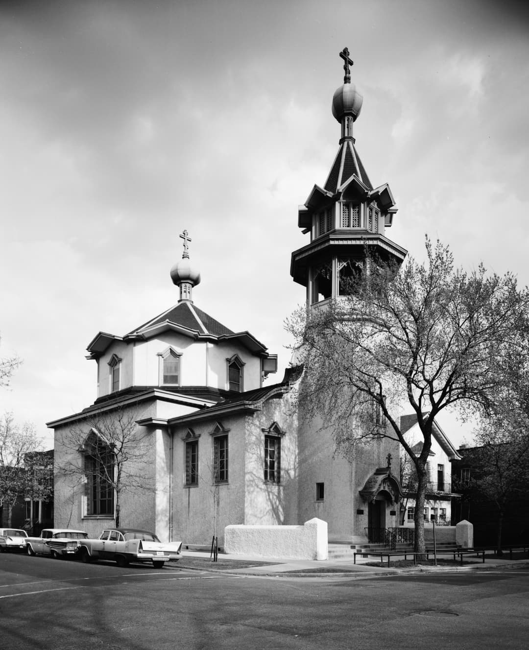 Street-corner exterior view showing the bell tower and central dome