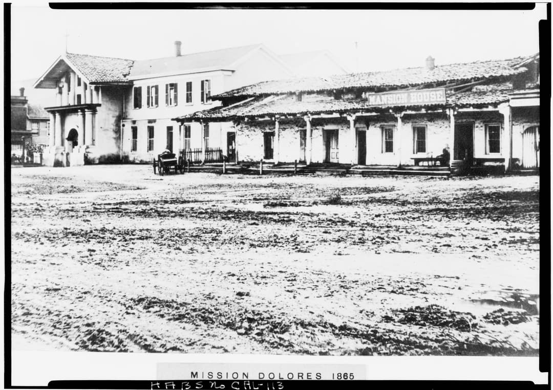 Historic 1865 exterior view of Mission Dolores and the Mansion House.