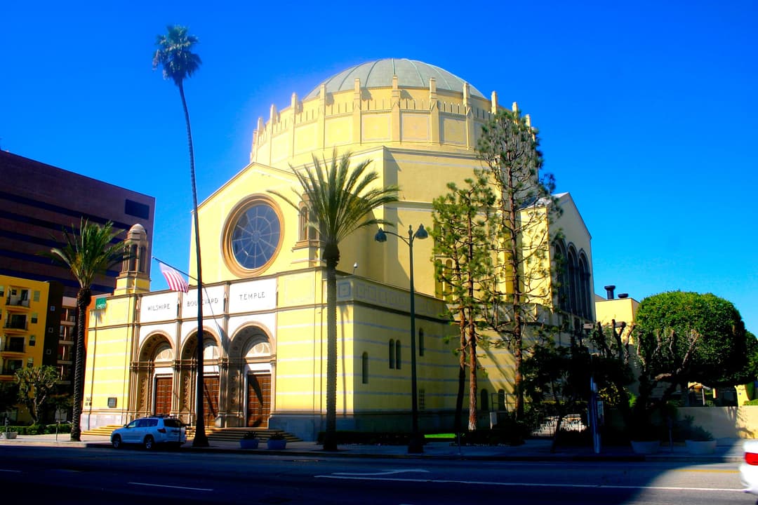 Front entrance and monumental Byzantine dome in bright daylight.