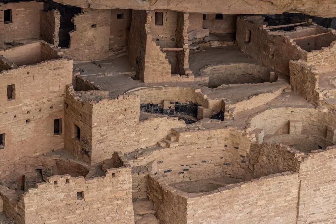 High-angle view of sandstone masonry structures and kivas at Cliff Palace.
