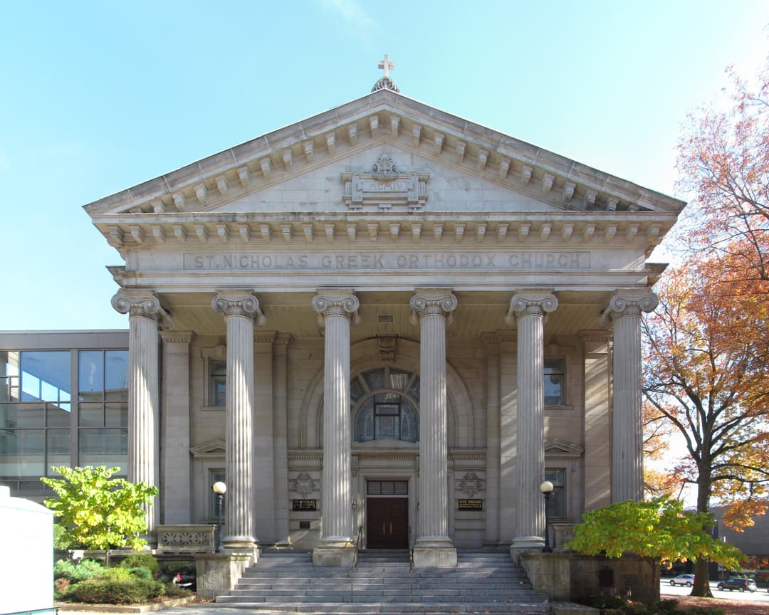 Front entrance and Neoclassical portico in daylight