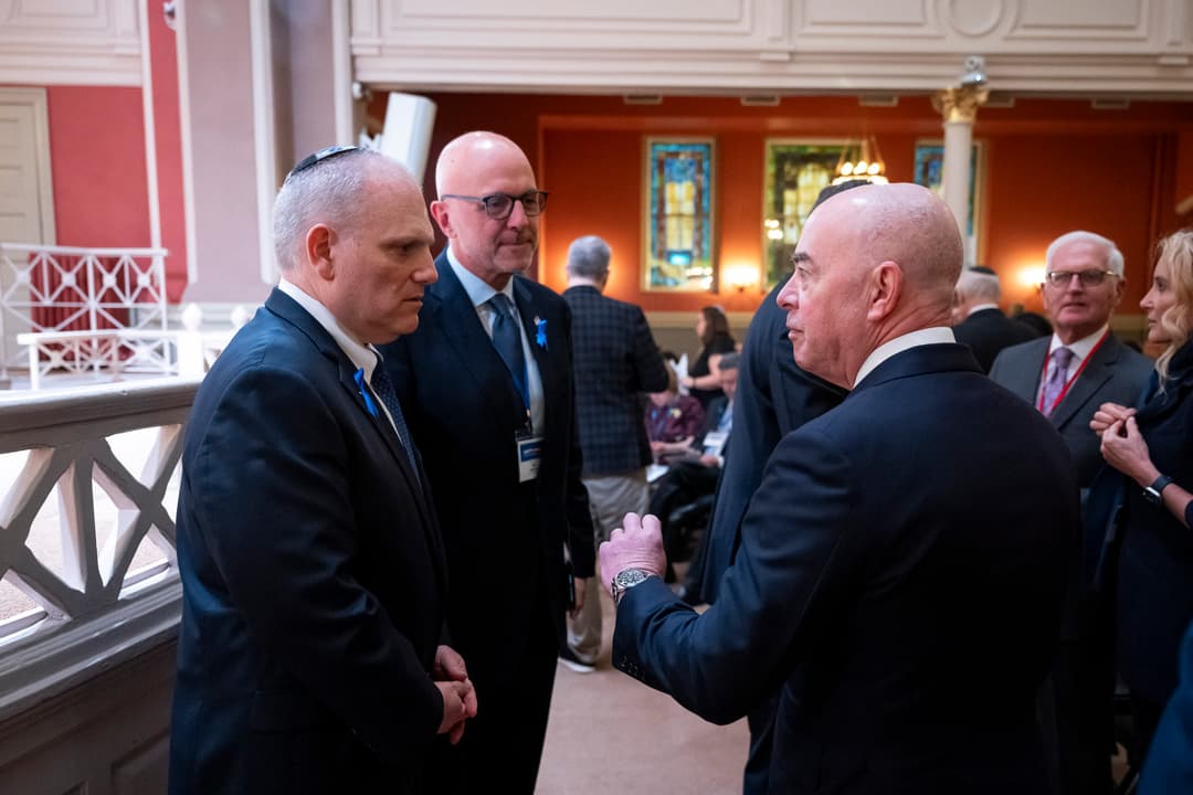 Interior view of guests conversing at Sixth & I Historic Synagogue.