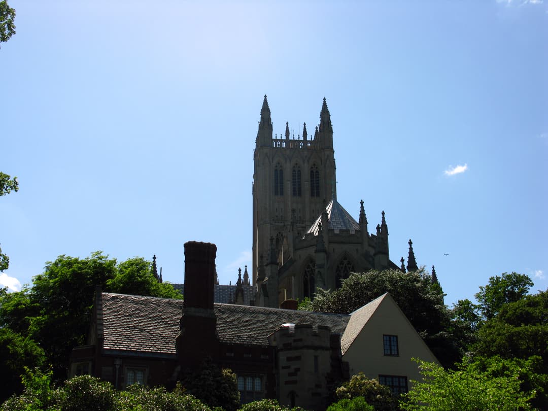 Low-angle exterior view of the Central Tower rising above cathedral grounds.