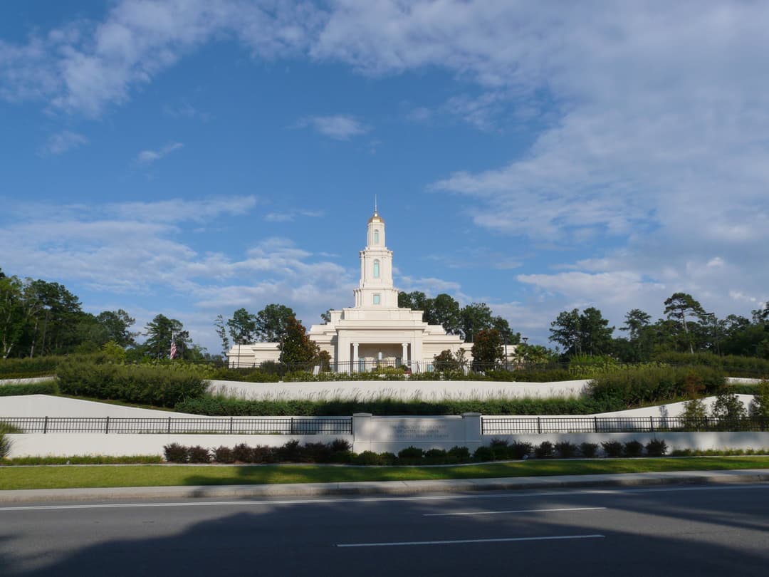 Wide daytime view of the Tallahassee Florida Temple from across the street.