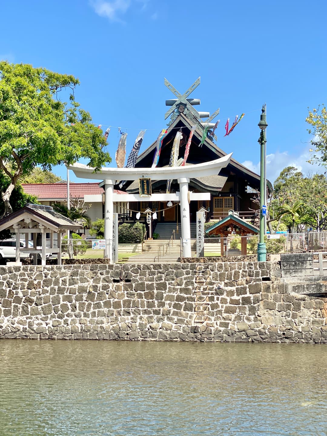 View across Nuʻuanu Stream toward the torii gate and main shrine