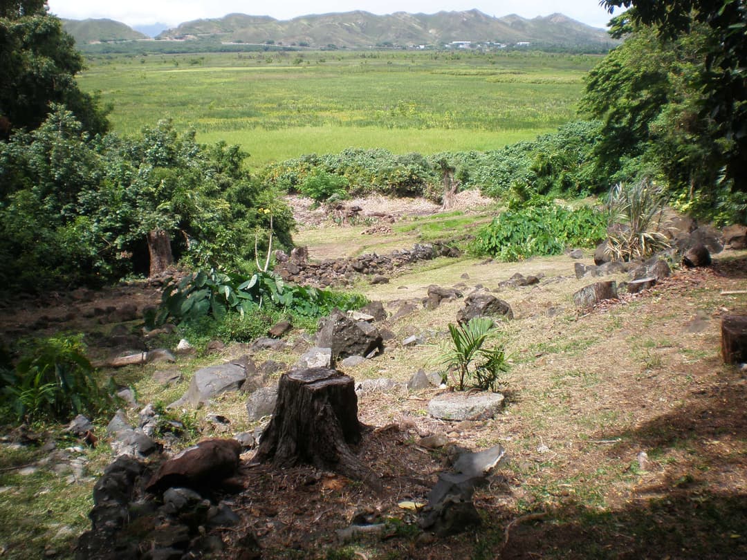 Elevated view from the stone platform toward Kawainui Marsh and mountains.