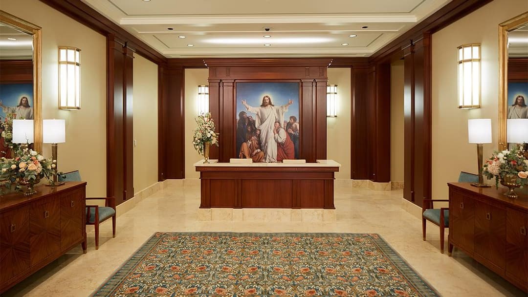 Meridian Idaho Temple interior with Christ painting, stand, and decor.