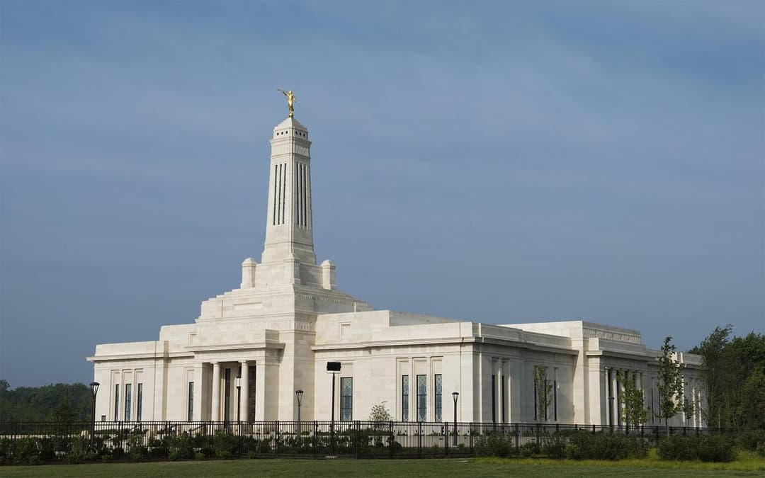 Indianapolis Indiana Temple exterior, spire with Angel Moroni, daytime.