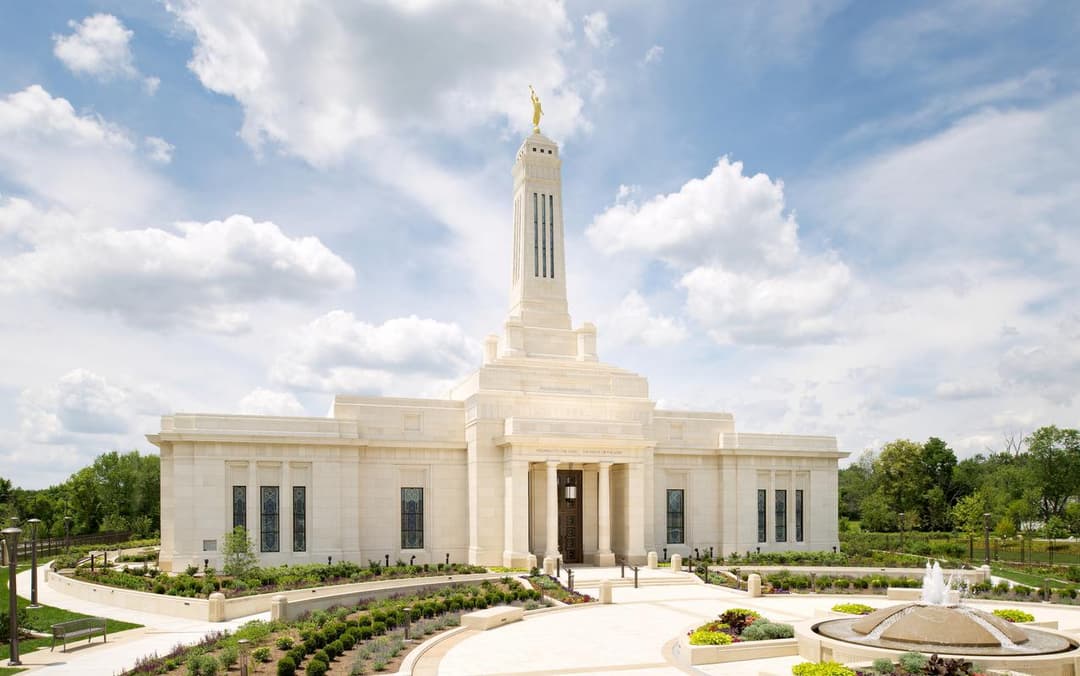 Indianapolis Indiana Temple front exterior, spire, grounds, and fountain.