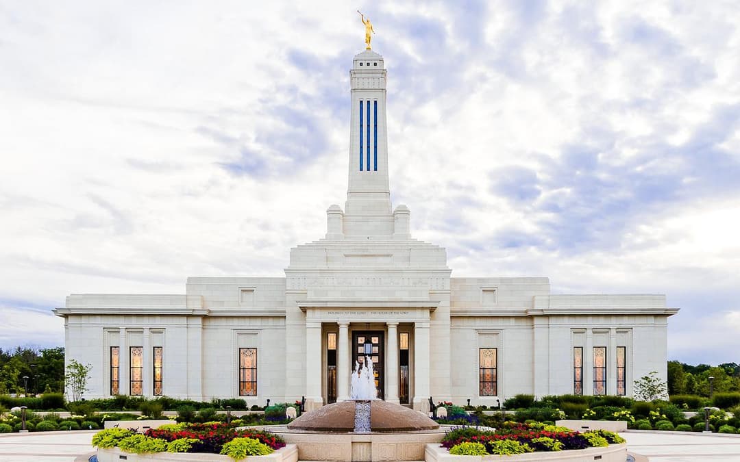 Indianapolis Indiana Temple, front view with Moroni, fountain, gardens, couple.
