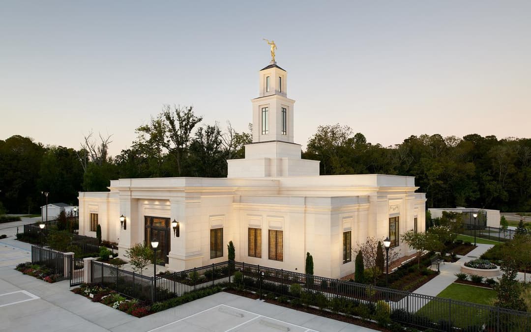 The elegant 83-foot-9-inch steeple topped with the gold-leafed Angel Moroni statue.