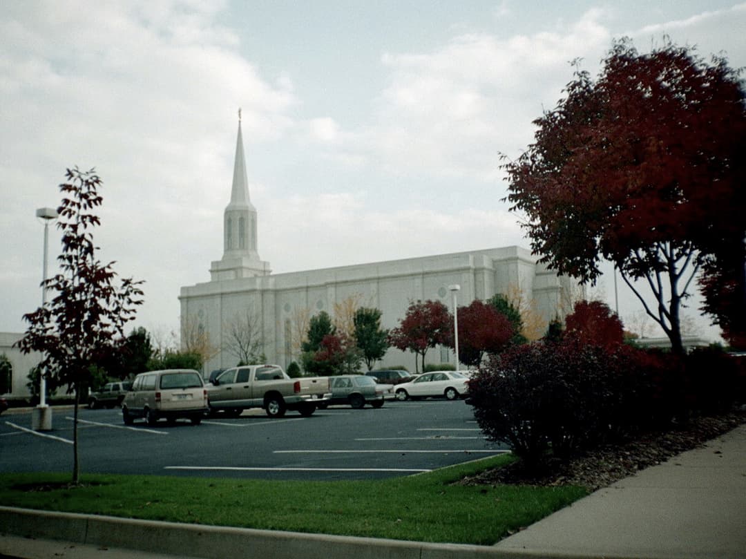 Exterior view of the St. Louis Missouri Temple across the parking lot.