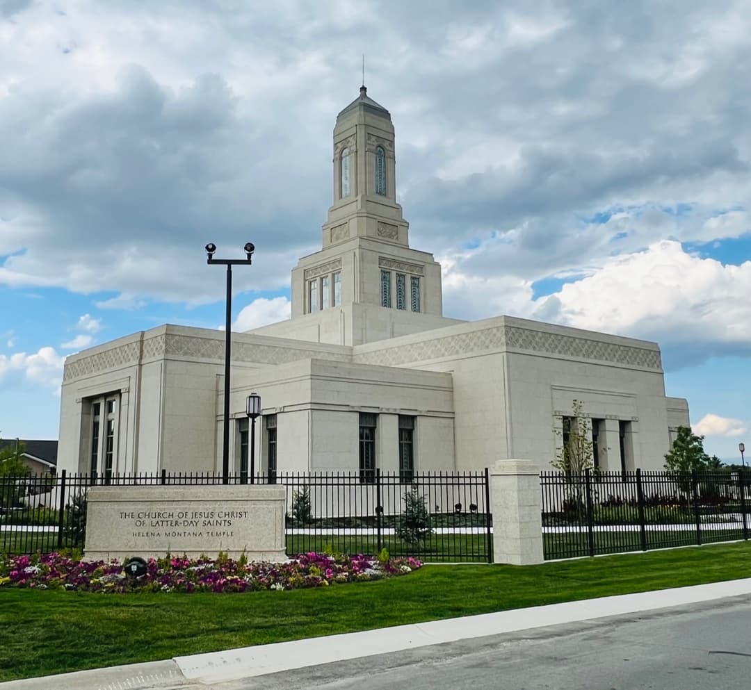 Helena Montana Temple exterior, central tower, sign, and landscaping.