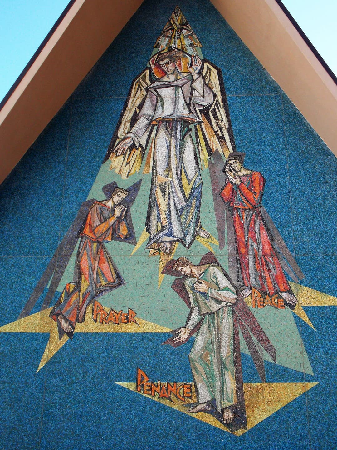 Exterior mosaic gable detail featuring Prayer, Penance, and Peace.