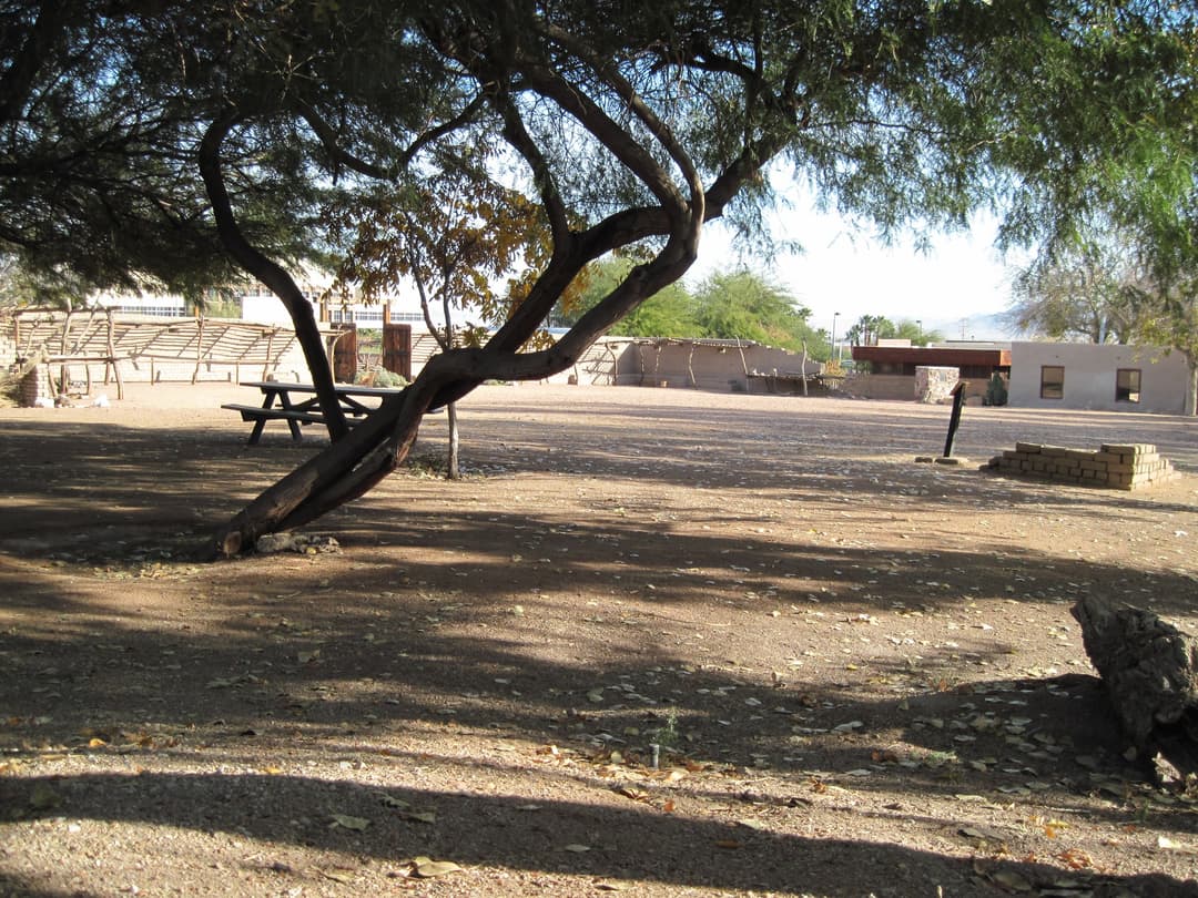 Courtyard and grounds of Old Las Vegas Mormon Fort in bright daylight.