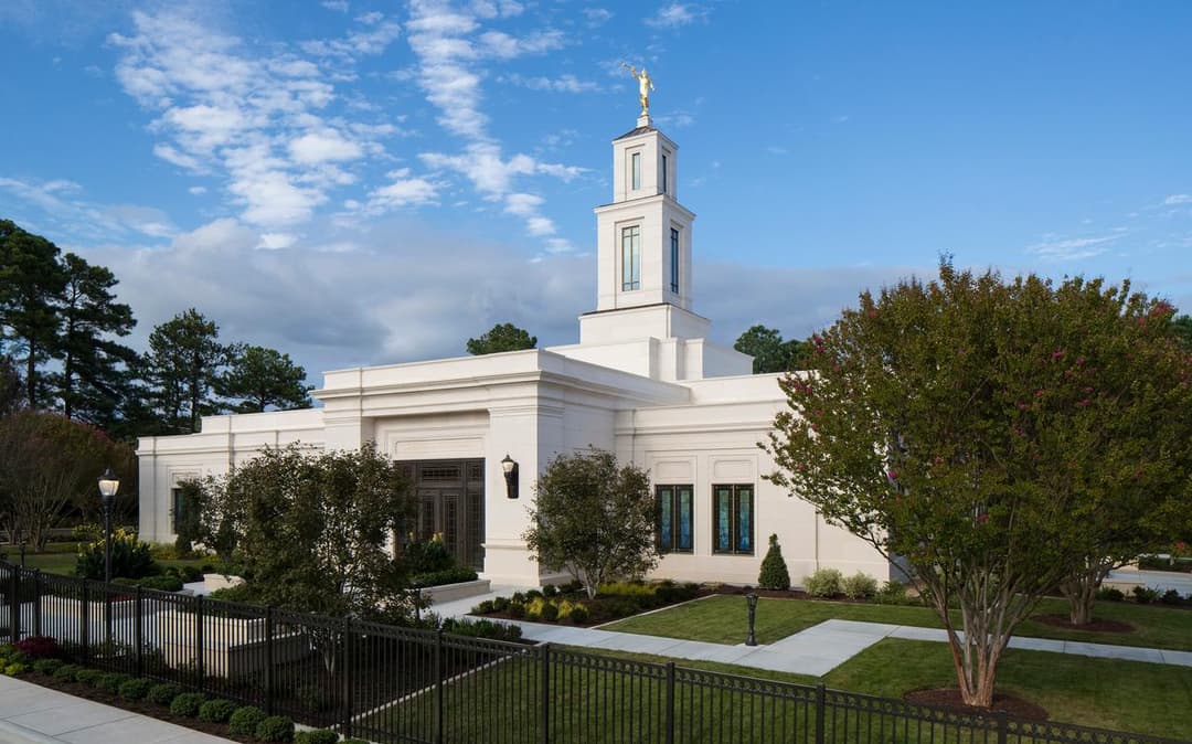 Angled exterior view of the Raleigh North Carolina Temple and central spire.