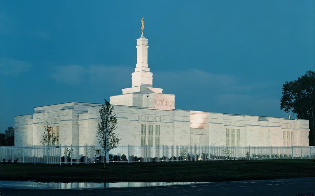 Wide-angle view of the Columbus Ohio Temple illuminated at twilight.