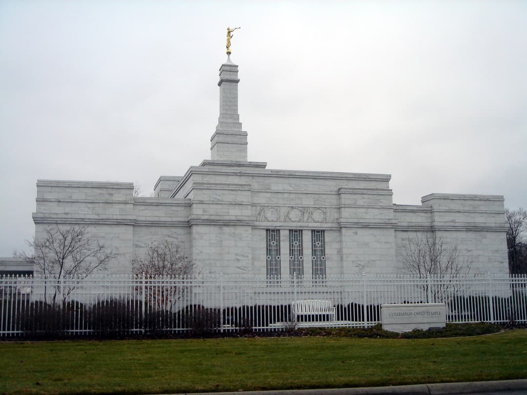 The Columbus Ohio Temple and its single spire on an overcast day.