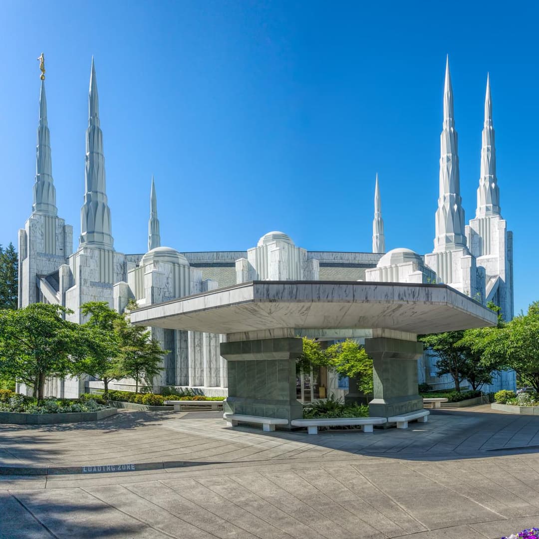 Portland Oregon Temple, front entrance, daytime. Six spires visible.