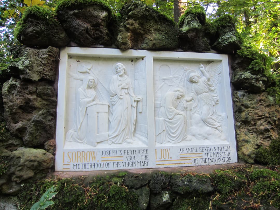 Relief plaque depicting the First Sorrow and Joy of St. Joseph on the grounds.