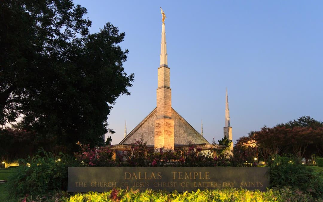 The temple entrance with its welcoming garden path and landscaping.