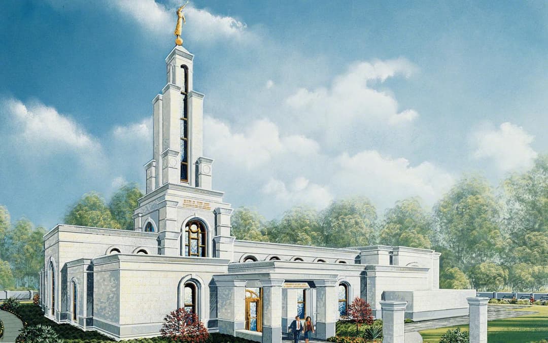 Daytime exterior of Lubbock Texas Temple with spire and Angel Moroni.