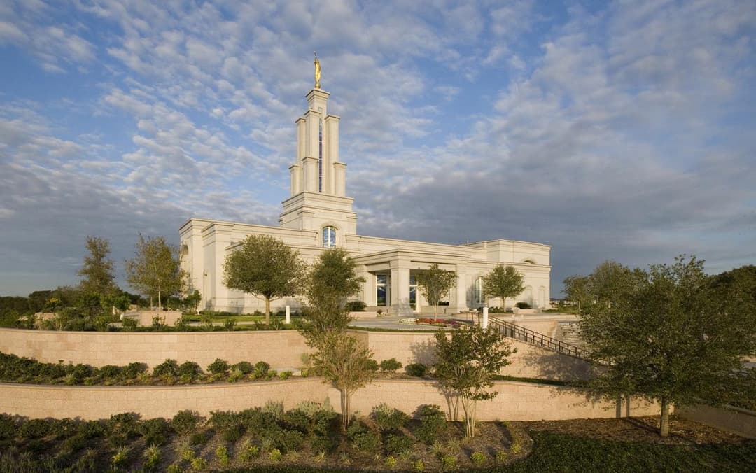 Wide-angle exterior view of the San Antonio Texas Temple and tiered gardens.
