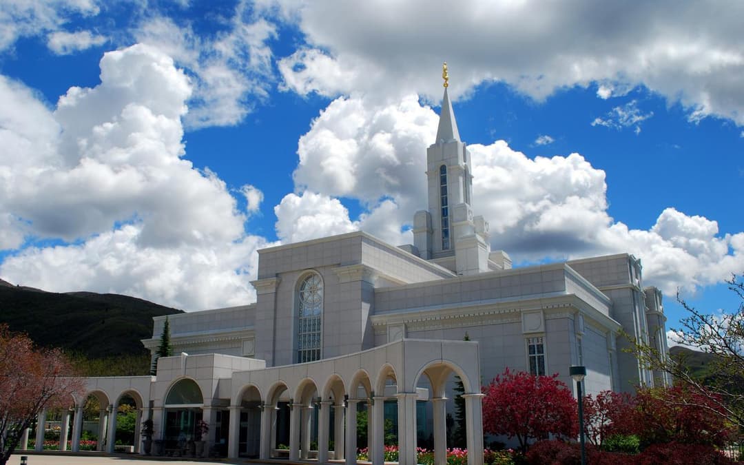 The Bountiful Utah Temple standing majestically against the Wasatch Range.