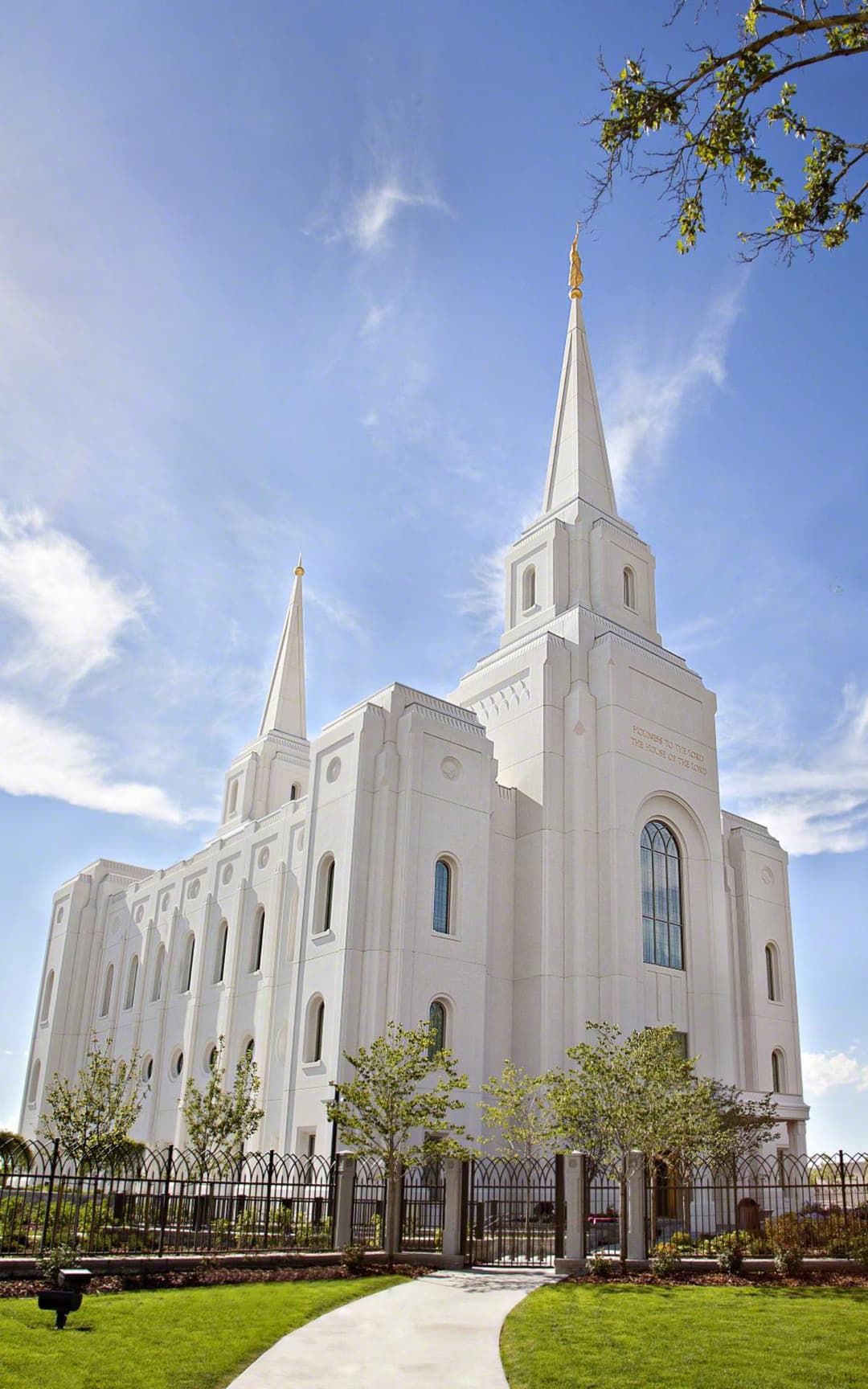 The historic Box Elder Tabernacle standing in architectural harmony directly across Main Street.
