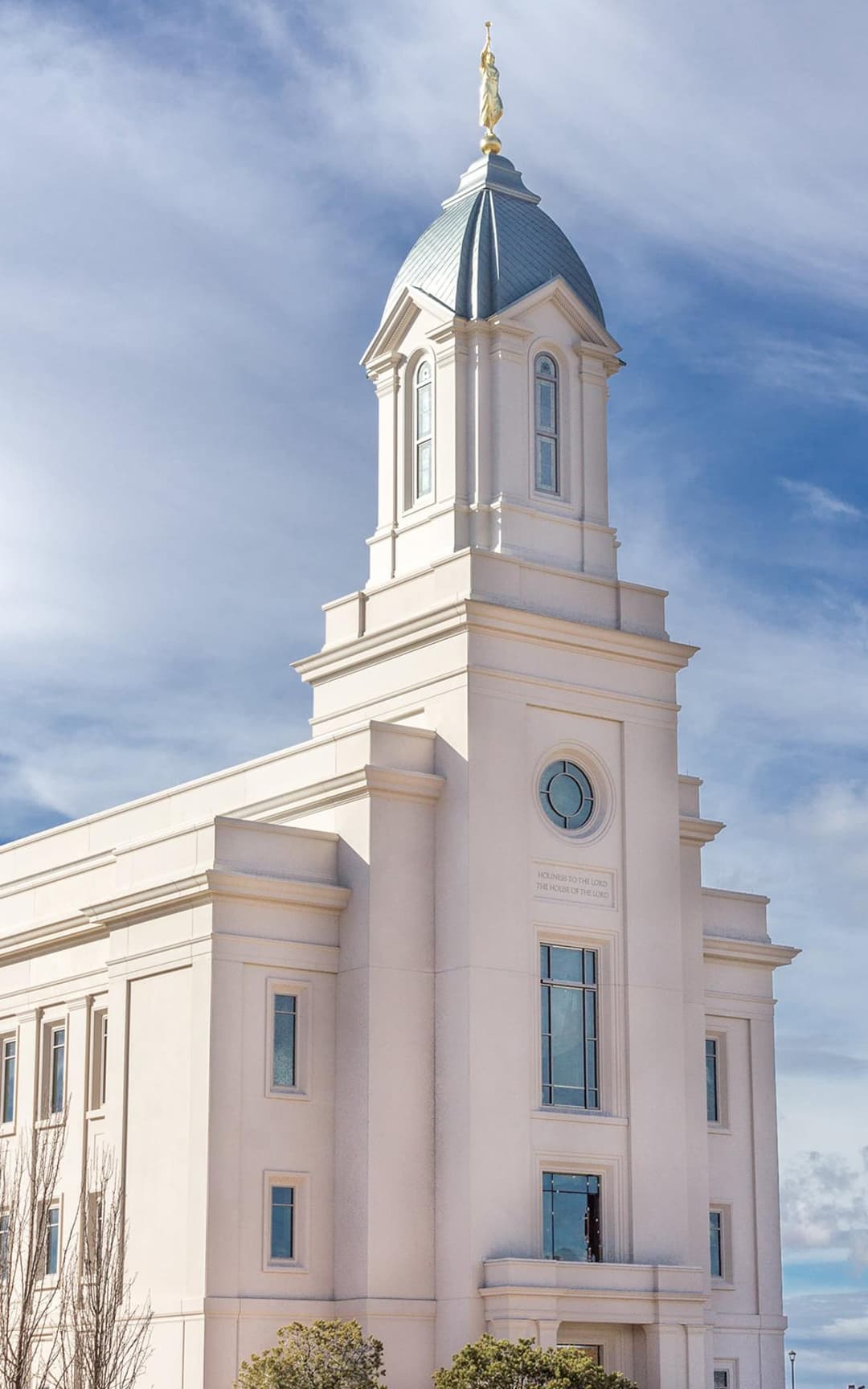 Low-angle daytime view of the Cedar City Utah Temple tower and spire.