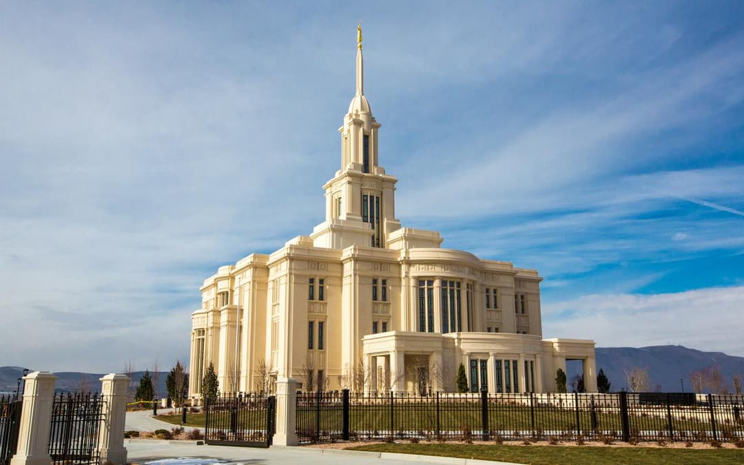 Wide-angle exterior view of the Payson Utah Temple on a clear day.