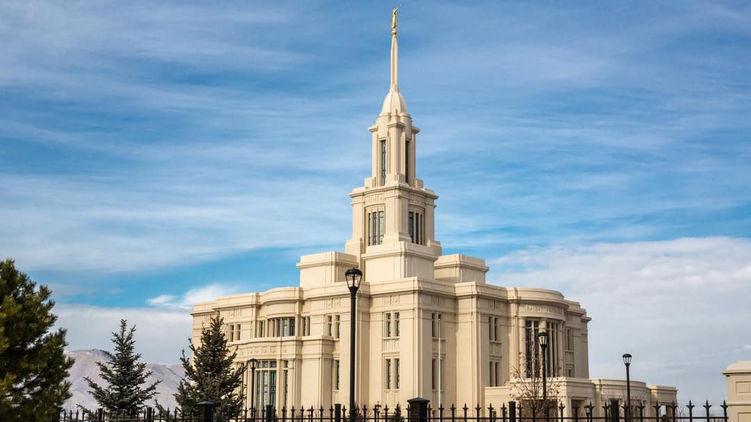 Angled daytime view of the Payson Utah Temple and central spire.