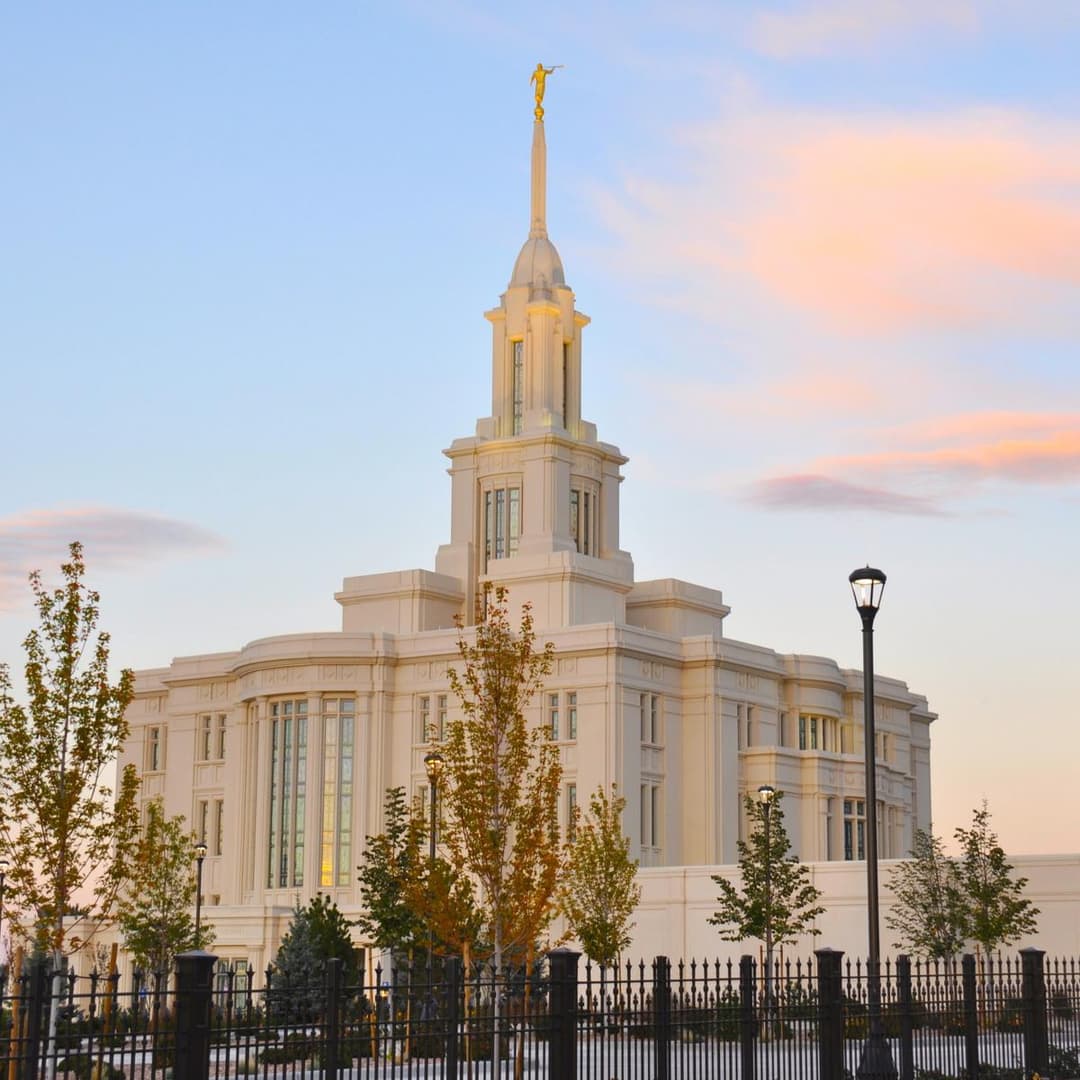 Exterior view of the Payson Utah Temple at twilight.