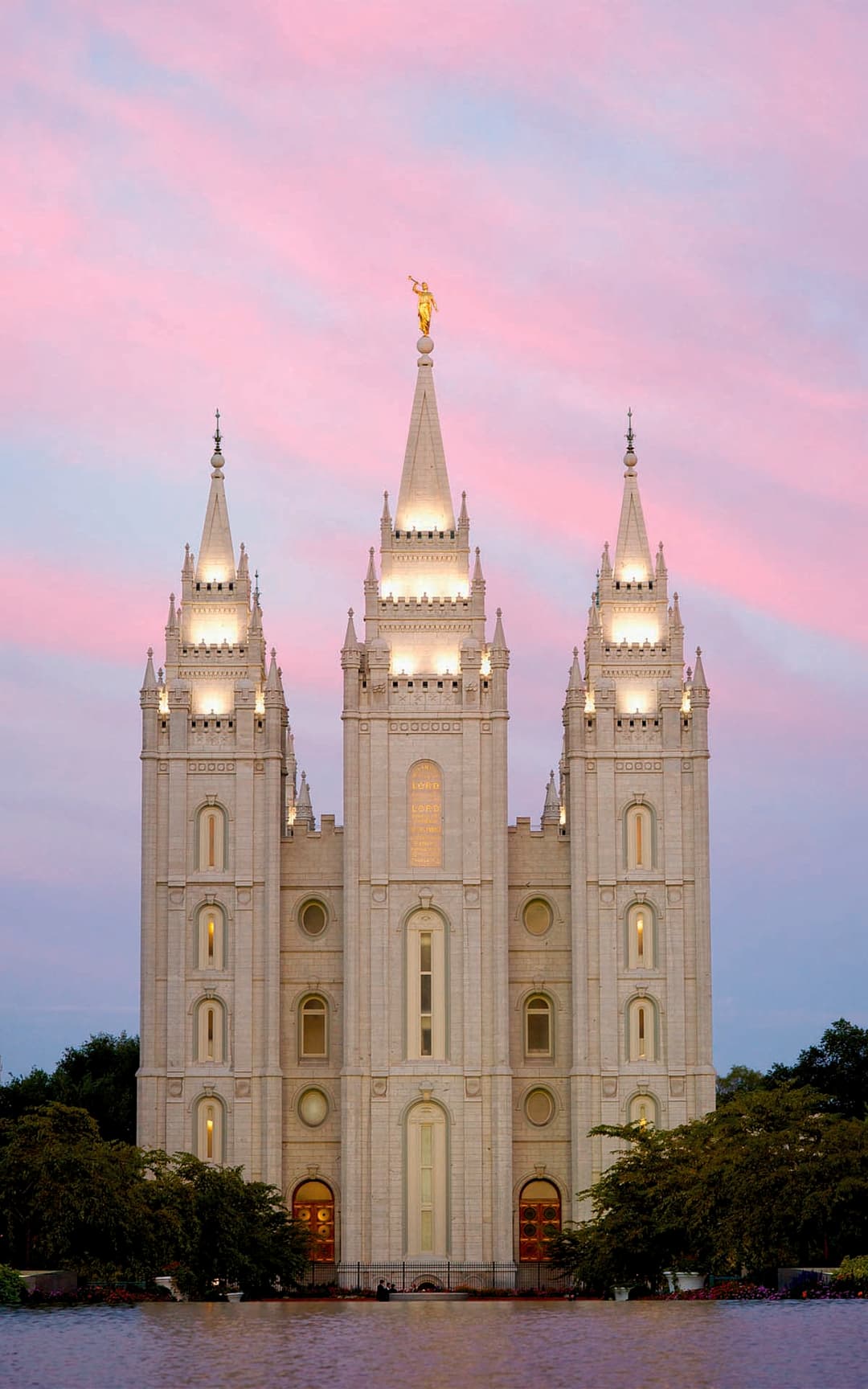 East towers of the Salt Lake Temple reflected at dusk