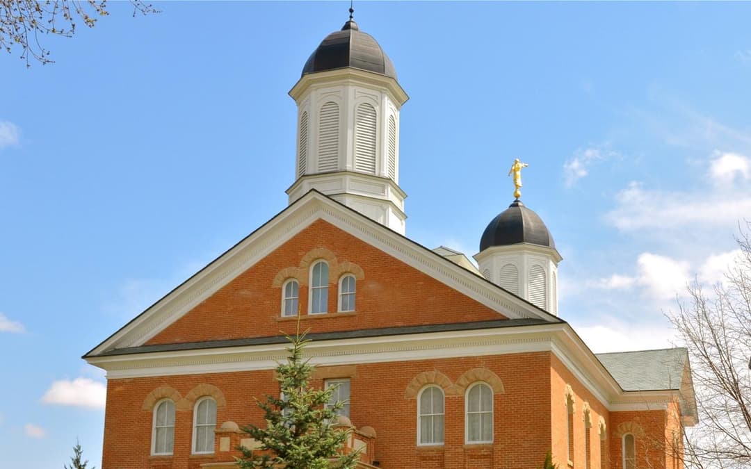 Exterior view of the red brick pediment and octagonal towers.