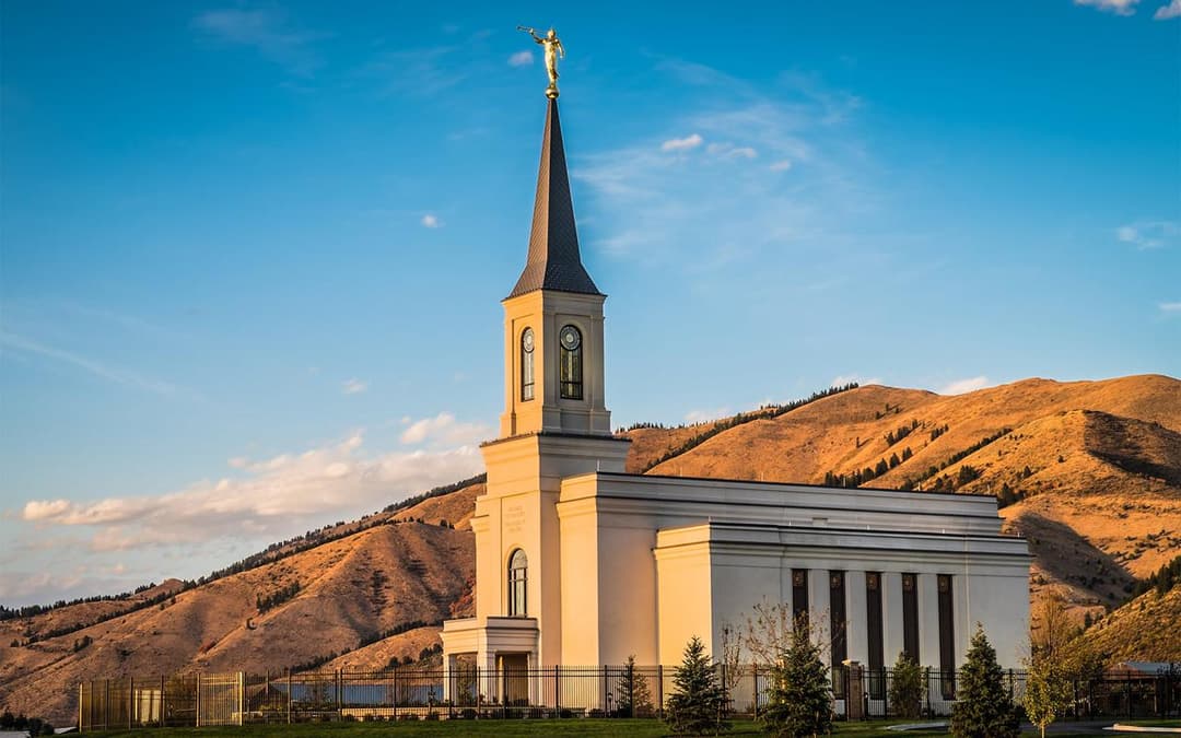 Star Valley Wyoming Temple at golden hour with mountain backdrop.