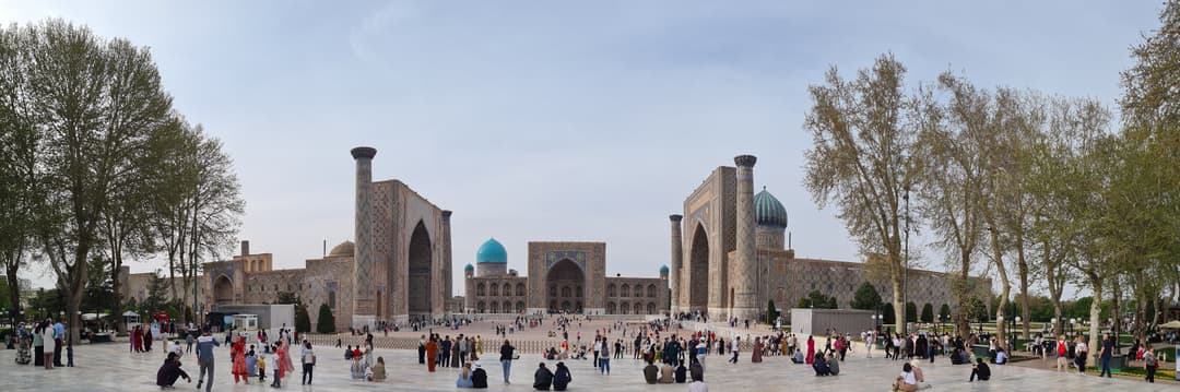 Wide panoramic view of the Registan ensemble and square in Samarkand