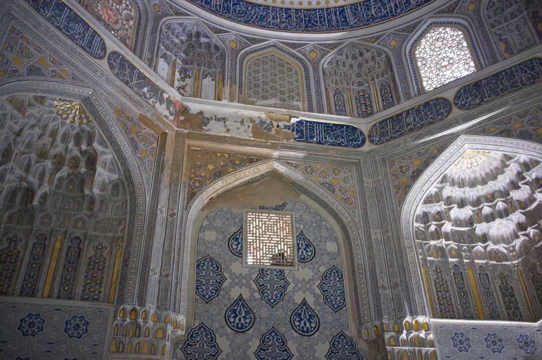 Interior squinch and muqarnas details inside a Shah-i-Zinda mausoleum
