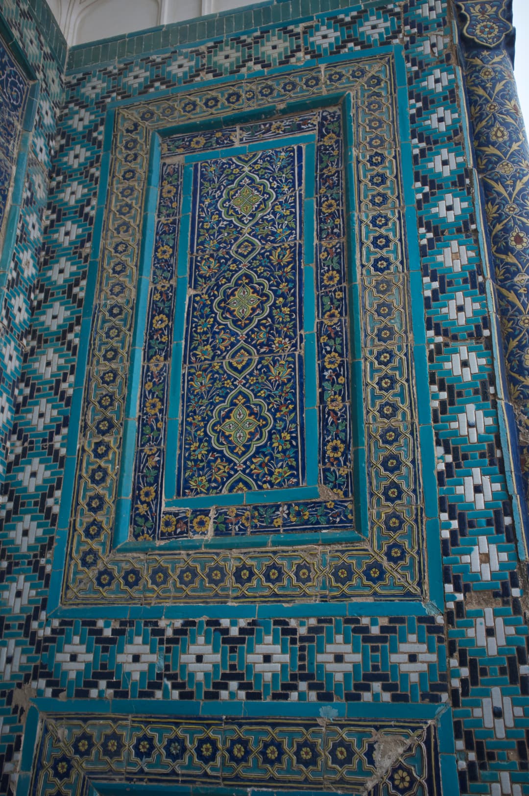 Detail of floral and geometric glazed tile panel at Shah-i-Zinda.