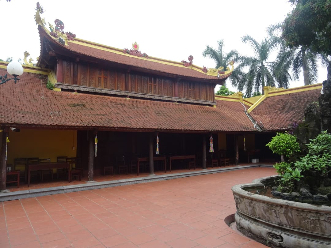 Courtyard view of traditional wooden architecture at Trần Quốc Pagoda.