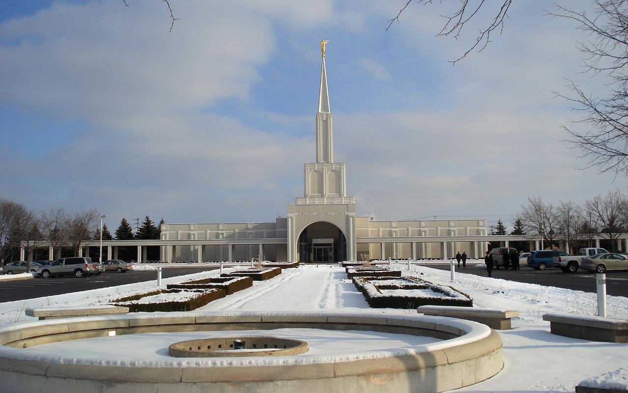 The Toronto Ontario Temple surrounded by lush greenery.